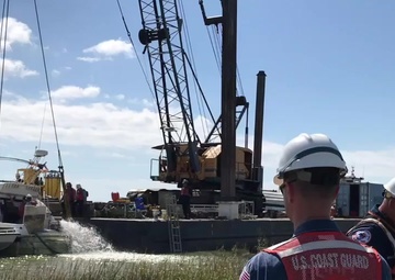 Cabin cruiser sunk by Hurricane Harvey refloated in Baytown, Texas