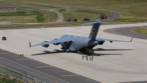 U.S. Military Lands C17 Aircraft with Two M142 High Mobility Artillery Rocket Systems Aboard in South Korea