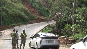 Citizen-Soldiers from South Carolina and Puerto Rico clear roads at Cayey