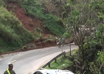 Citizen-Soldiers from South Carolina and Puerto Rico clear roads at Cayey