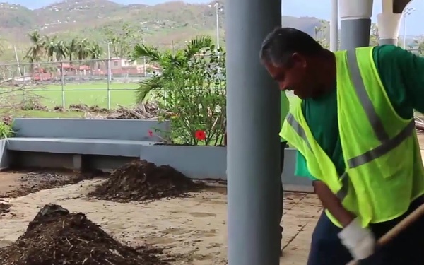 Local contractors clear pavement for water purification center in Canovanas Puerto Rico