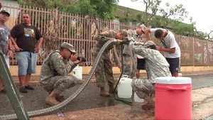 B-roll of PRARNG distributing water in Morovis