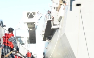 USS Anchorage Departs Broadway Pier