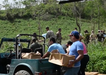 Hurricane Maria: Chinooks bring food and water to Coamo (60 sec)