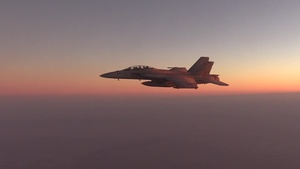 KC-135 Provides Aerial Refueling for F-18s