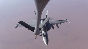 KC-135 refuels USN F/A 18 Hornets