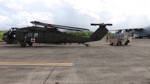 Part 1 of members of 101st Combat Aviation Brigade, Fort Campbell, Ky., as well as other supporting units here load Blackhawk helicopters aboard the C-17 out of Charleston, S.C.