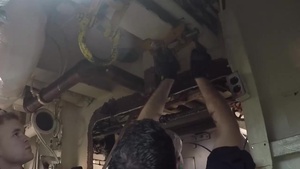 Sailors Re-Install a Bulkhead