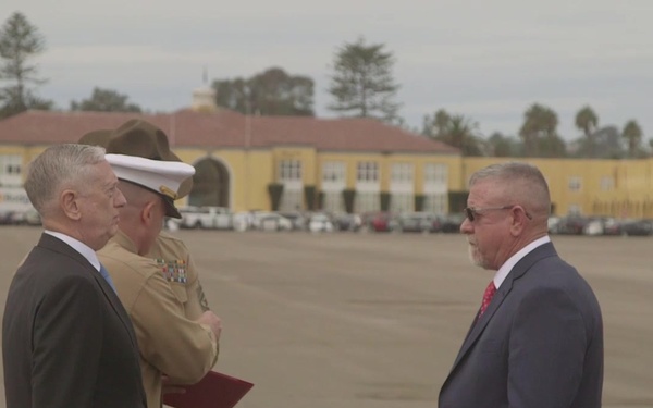 Secretary of Defense James Mattis awards the Bronze Star to GySgt Kendall Haff (Ret.)