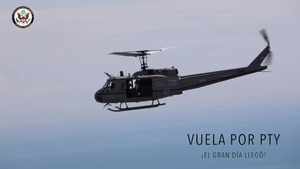 US Ambassador John D. Feeley and Leyda Díaz ride in a helicopter over Panama City, Panama