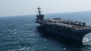 The Aircraft Carrier USS Theodore Roosevelt (CVN 71) Transits the Arabian Gulf