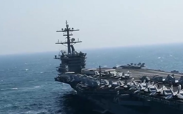 The Aircraft Carrier USS Theodore Roosevelt (CVN 71) Transits the Arabian Gulf
