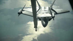 F-22 Raptors Refuel Over Iraq
