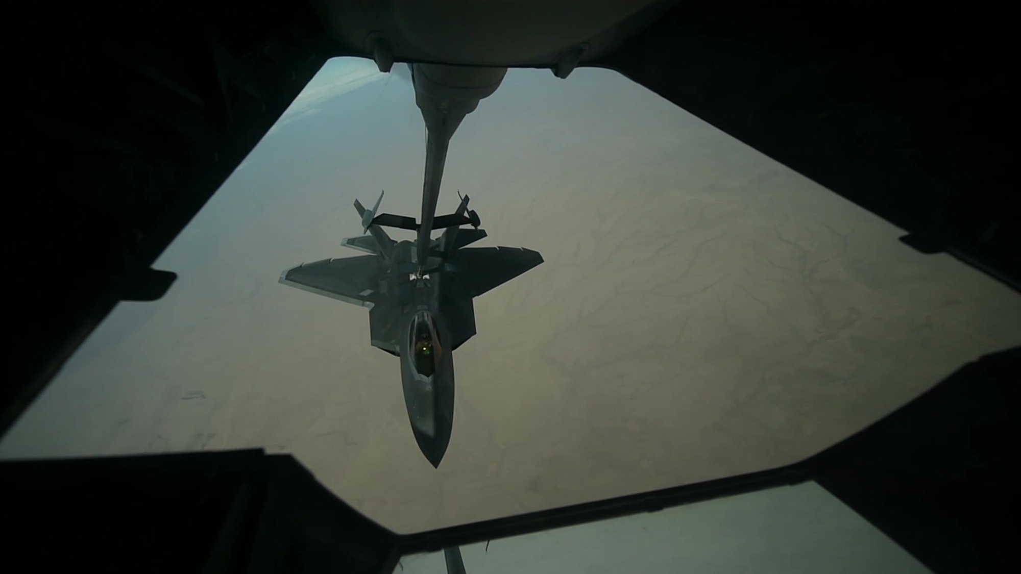 SrA Adam Stickney, a KC-10 Extender Boom Operator from the 908th Expeditionary Refueling Squadron, AL Dhafra Air Base, United Arab Emirates, ensures F-22 Raptors receive fuel safely and efficiently while flying over Iraq Nov. 29, 2017. Boom Operators pump thousands of gallons of jet fuel during each flight. These highly trained experts must have steady hands to refuel each aircraft and ensure mission success. (U.S. Air Force video by Senior Airman Nathaniel Stout).