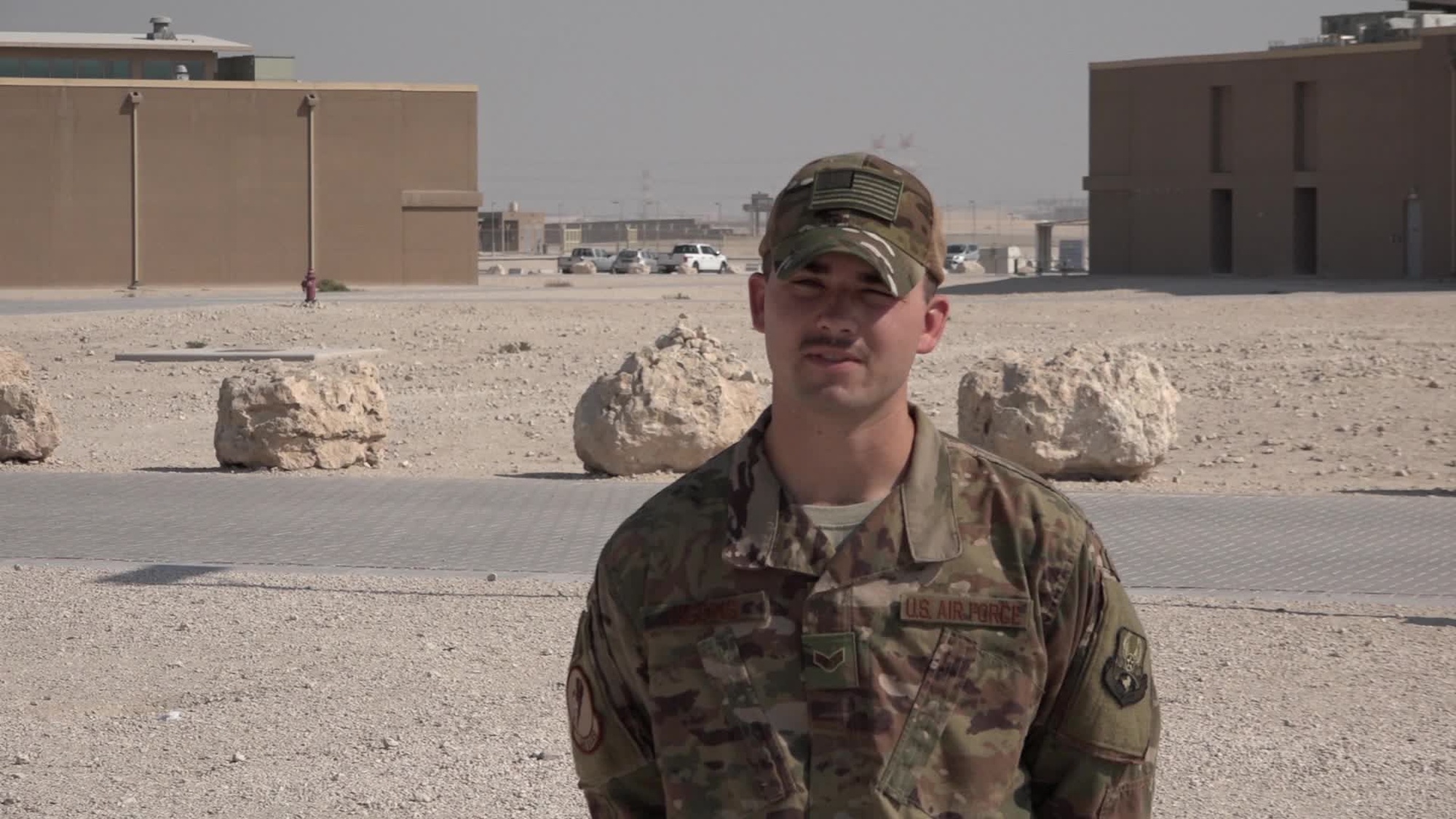 Senior Airman Tyler Higgins gives a &quot;shout out&quot; for Christmas at Al Udeid Air Base, Qatar, filmed on Nov 17, 2017 (U.S. Air National Guard video by Staff Sgt. Aubrey Griffin/Released).