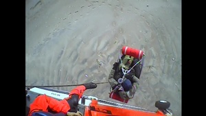 Coast Guard Air Station Savannah helicopter crew rescues 2 canoers stranded on Little Tybee Island, Ga.
