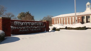 Ice, snow blankets base community