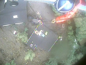 USCG MH-65 Dolphin Helicopter crew hoist mudslide victims in Santa Barbara County