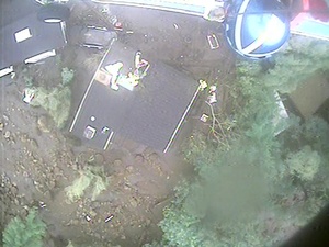 USCG MH-65 Dolphin Helicopter crew hoist mudslide victims in Santa Barbara County