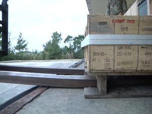 Soldiers with 10th RSG prepare ammo for training