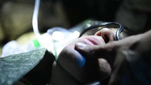 83rd ERQS Pararescuemen conduct patient care training on a U.S. Army CH-47 Chinook