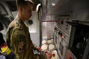 BROLL: A Senior Airman becomes a popular pizza guy with his ‘combat kitchen’ in the sky