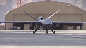 MQ-9 Reaper takes off with GBU-38s.