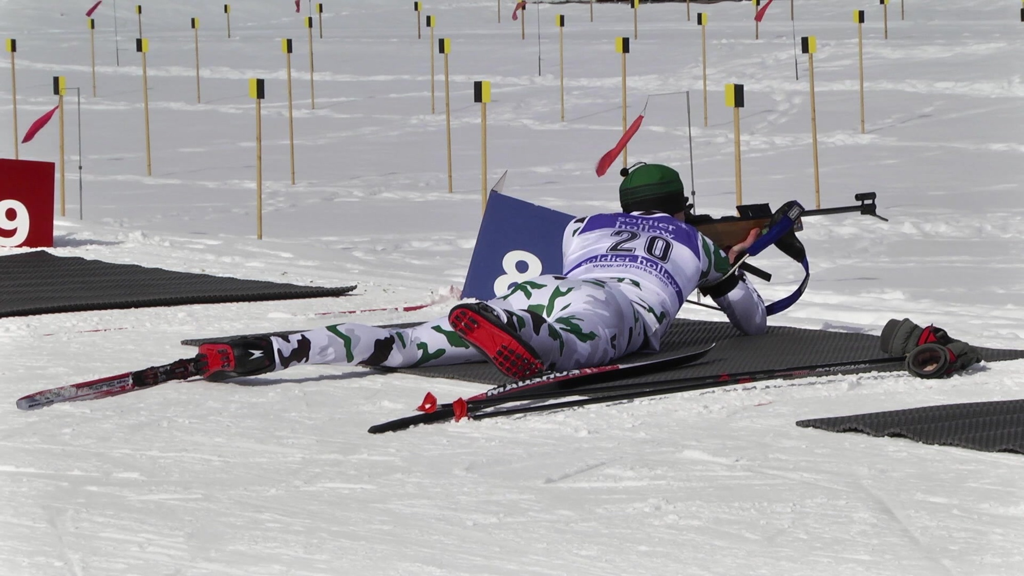 Vermont National Guard biathletes compete in a Sprint Race at Soldier Hollow in Utah. Video features rifle zeroing, cross-country skiing and shooting at specialized targets. (B-ROLL)