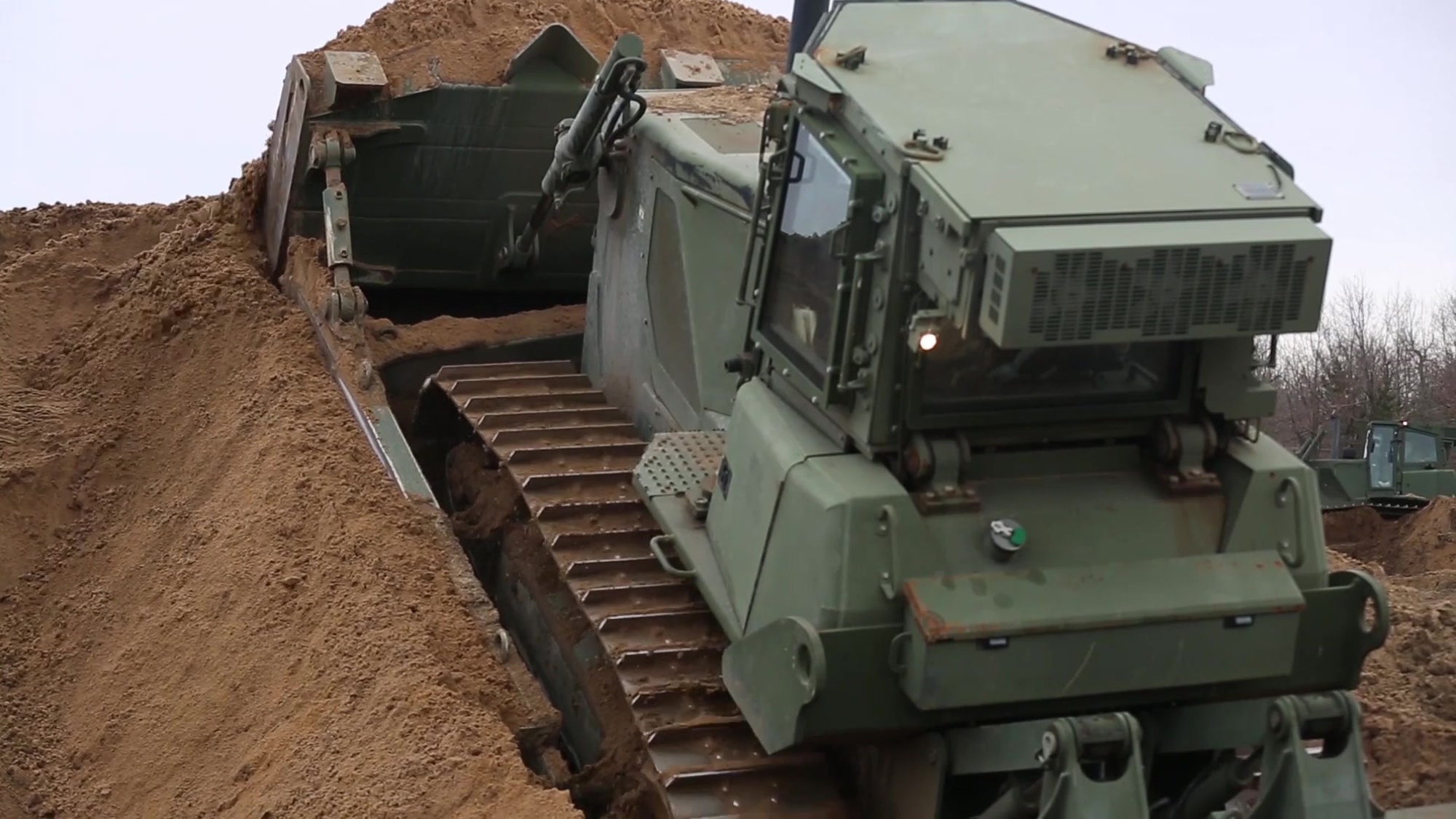 U.S. Marines with Heavy Equipment Platoon, 2d Combat Engineer Battalion (CEB), 2d Marine Division, conducts retrograde during cold weather training at Fort Drum,  N.Y., February 22, 2018. 2d CEB participated in training designed to improve units capabilities in extreme cold weather environments. (U.S. Marine Corps video by LCpl. Elijah J. Abernathy)