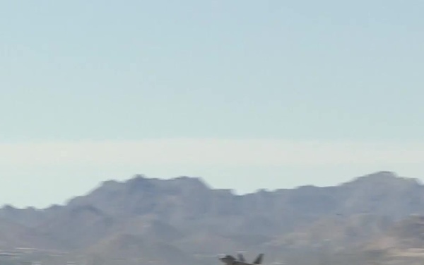 Two P-51 Mustangs and a F-22 Raptor Fly Together