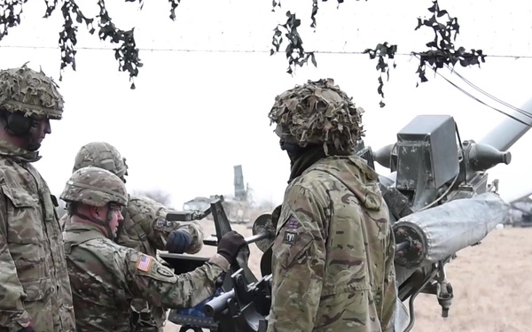 British fire Howitzers during Dynamic Front