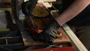 Airman shapes hearts, minds with sawdust