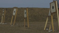 FET IN ACTION: Marines and Romanians participate in a live-fire range during