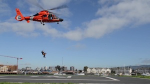 Coast Guard MSST 91105 team members and their canine partners conduct Canine Explosive Detection capabilities demonstration on Coast Guard Island