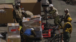 Marines and Sailors with the ARG/MEU participate in a Replenishment at sea