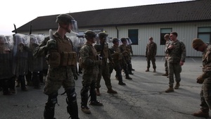Infantry Marines learn riot control tactics during non-lethal training in Norway