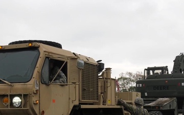 US Army Engineers Load Excavator in Romania (B-Roll)