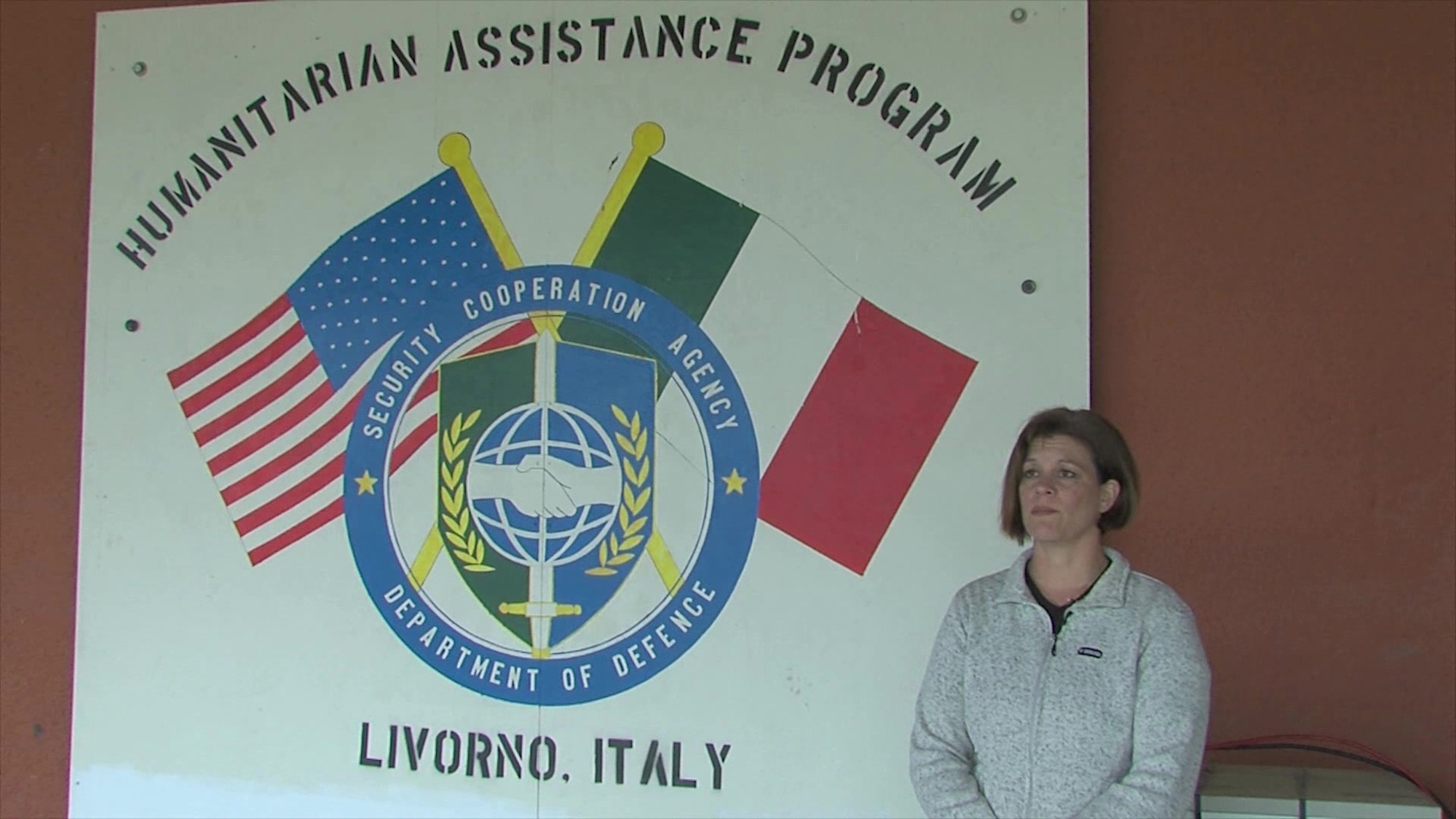 Janine Wick, Program Manager for Humanitarian Assistance Program, explains the purpose of HAP, Camp Darby, Italy, May 14, 2018.  <br />(Video by Vincenzo Vitiello/Released).