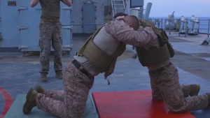 26th MEU Marines participate in a culminating event as part of an MAI course aboard the USS Oak Hill at sea