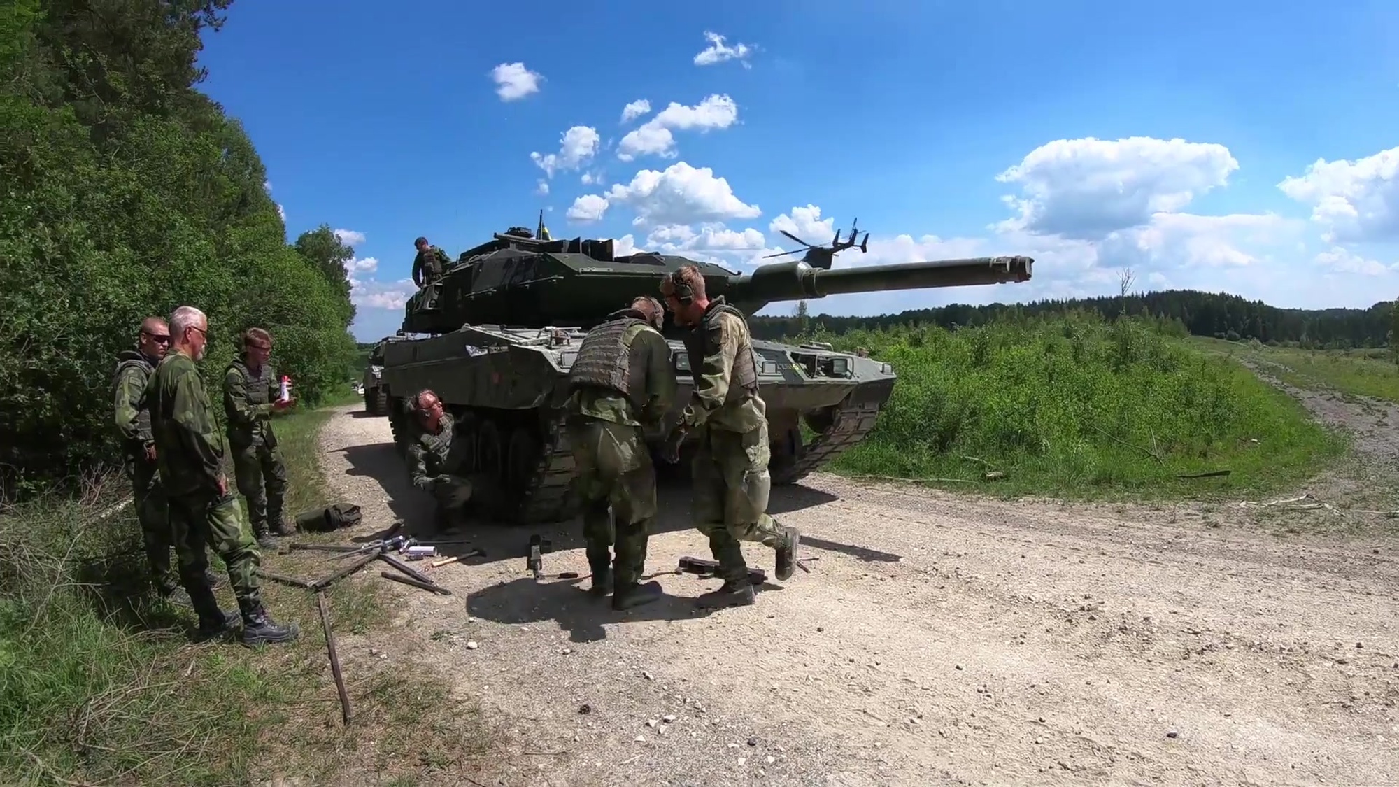 Soldiers from the Swedish 2nd Battalion 70th Armor Regiment are tested on their ability to correctly report improvised explosive device (IED), react to a casualty, call for casualty assistance, and perform hasty vehicle repairs in a hostile environment during todays Strong Europe Tank Challenge competition. U.S. Army Europe and the German Army co-host the third Strong Europe Tank Challenge at Grafenwoehr Training Area, June 3 - 8, 2018. The Strong Europe Tank Challenge is an annual training event designed to give participating nations a dynamic, productive and fun environment in which to foster military partnerships, form Soldier-level relationships, and share tactics, techniques and procedures.