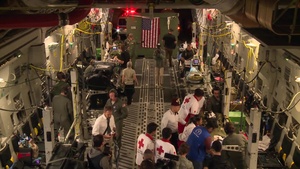 Aeromedical Crew Loading Aircraft during Fuego Relief
