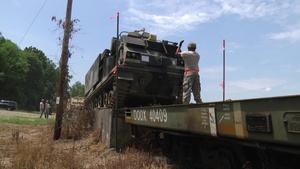 Arkansas National Guard Loads Tracked Vehicles onto Railcars