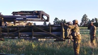 Tennessee Artillery Unit Fires High Mobility Artillery Rocket System at Operation Western Strike