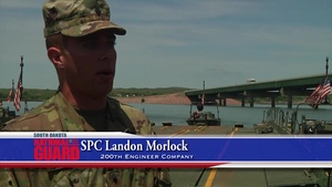 South Dakota Army National Guard 200th Engineer Company conducts a river crossing mission.