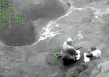 Coast Guard aircrew hoists 3 fishermen in Willapa Bay, Wash.