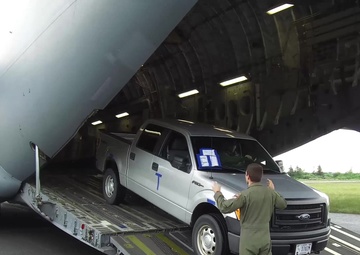 Coast Guard and Alaska Air National Guard load C-17 Globemaster III with equipment in support of Arctic Shield 2018