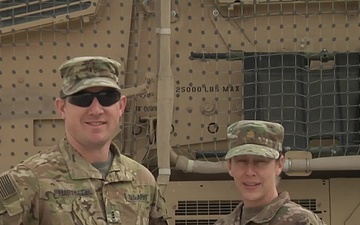 Chief Warrant Officer 3 Sid Hartsell and Maj. Missy Hartsell share a 4th of July greeting