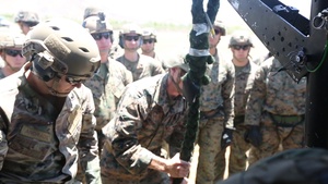 Fast-rope ready: HMLA-369 supports ground