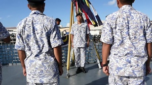 Royal Malaysian Navy Frigate KD Lekiu (FFG) perform morning colors