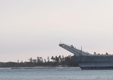 USNS Sioux tugs the decommissioned tank landing ship Ex-Rancine out to sea
